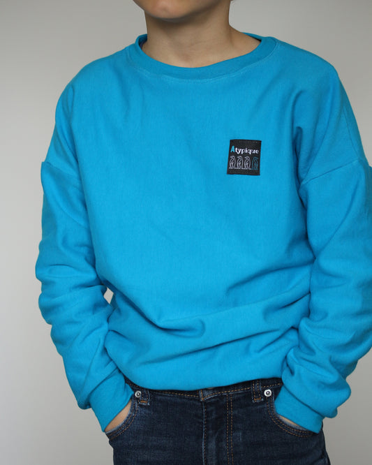 Sweat en coton enfant bleu turquoise "Atypique"