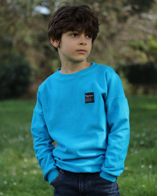Sweat en coton enfant bleu turquoise "Atypique"